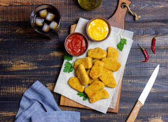 Chicken nuggets with two sauces. Fast food. American food.