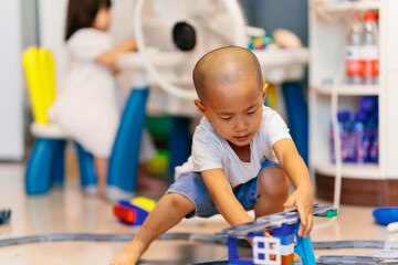 kid playing building block game