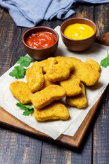 Chicken nuggets with two sauces. Fast food. American food.