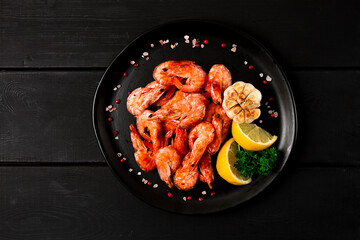 Fried shrimp, on a black background, top view, no people,