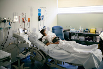 Pregnant woman being monitored before giving birth.