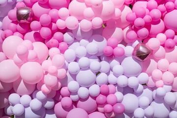 Stylish metallic pink balloons for Valentine's day, hen party or baby shower on a white background