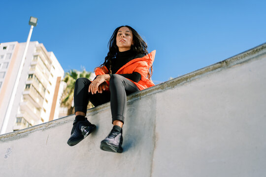Stylish woman in skate park