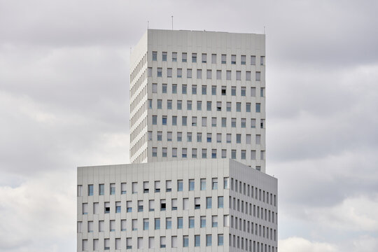 Modern buildings on cloudy sky.