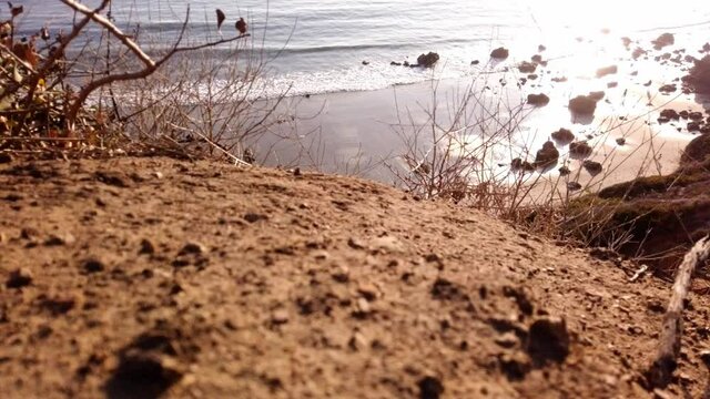 Time lapse of people walking at the beach El Matador in Malibu during golden hour, wonderful landscape
