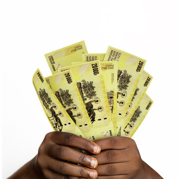 hands holding 3D rendered Congolese Franc notes. closeup of Hands holding Congolese currency notes