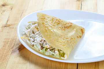 Pancake with chicken caesar salad