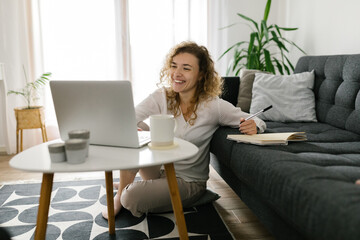 Female student studying online from home