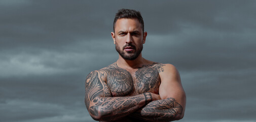 Confident attractive man with serious face. Naked male shoulders, topless athletic body. - obrazy, fototapety, plakaty