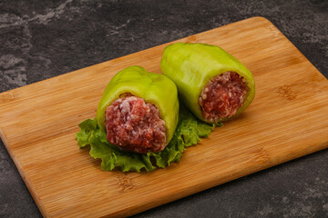Raw stuffed pepper for cooking