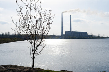 Panoramic view of power station Lukomlskaya Gres. Chimneys with smoke of power plant. Ecological problem. Environmental pollution concept.