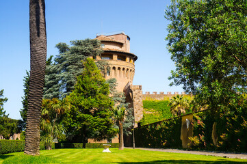 Fototapeta na wymiar Saint John's Tower in the Vatican Gardens. The Medieval tower is located along an ancient wall built by Pope Nicholas II