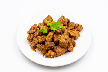 Fried liver cubes on a white background. Turkish Traditional Food Arnavut Cigeri. Horizontal view. Close up