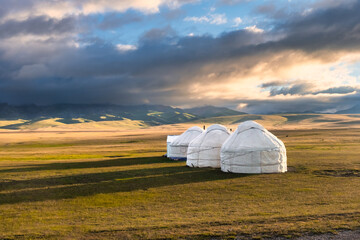 Traditional Yurt camp at the Son Kul lake plateau in Kyrgyztan - obrazy, fototapety, plakaty