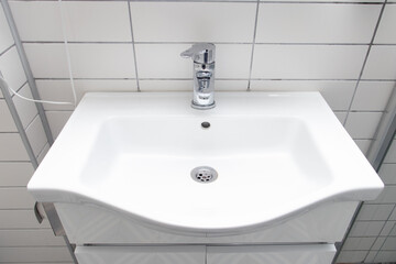 White ceramic sink in the bathroom
