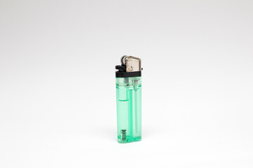 Green gas lighter isolated on white background
