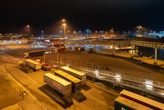 Ferry terminal and loading of the ro-ro ship in the harbor of Ystad at night. The ferry connects the city of Świnoujście in Poland and Ystad in Sweden