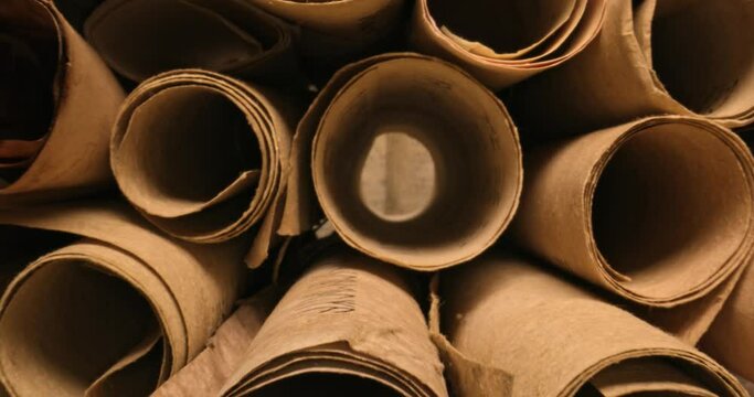 Scribe library. Retro futhpak scrolls stacked on a pile.