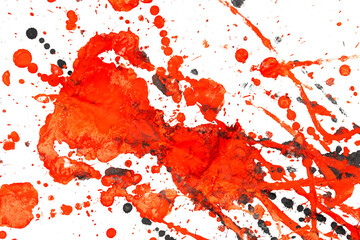 Black and red drops of paint on a white background.