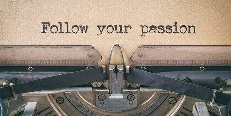 Text written with a vintage typewriter - Follow your passion