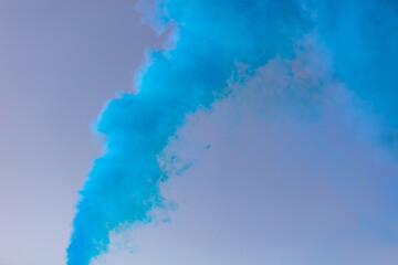 Blue smoke on a blue background.