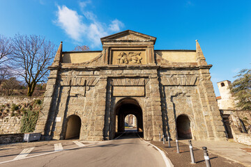 Fototapeta na wymiar Ancient Gate of San Agostino (Saint Augustine) and the surrounding walls (1561). Bergamo old town with the statue of the Winged Lion of Saint Mark, UNESCO world heritage site, Lombardy, Italy, Europe.