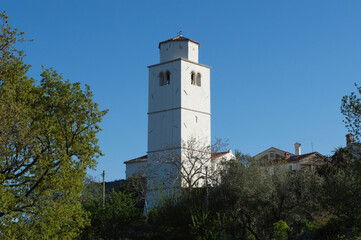 Fototapeta na wymiar Brseč, small village in western Croatia, bell tower from church of St Juraj