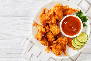 Crispy Fried Butterfly Shrimp on a white plate