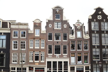 Fototapeta na wymiar Amsterdam Singel Canal Historic House Facades with Neck Gables, Netherlands