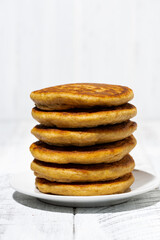 stack of corn pancakes, vertical
