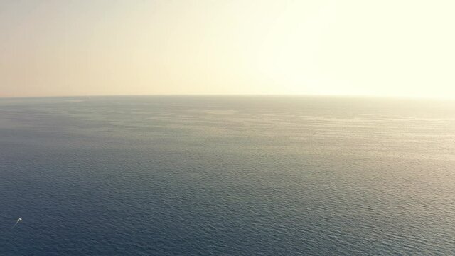 Flight motion over the sea.  Ligurian coast.  Destination summer vacation. Aerial view.