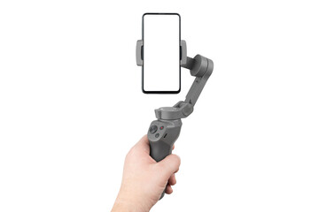 Stabilizer for a smartphone in hand on a white background. Gimbal and smartphone with white screen isolated on white background.