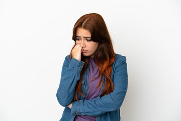 Young redhead woman isolated on white background having doubts