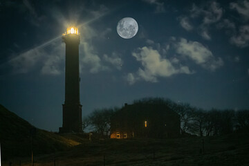 Leuchtturm Norderney bei Nacht mit Vollmond