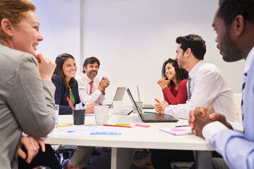 Group of business people at the conference table in a meeting