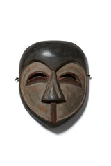 wooden mask of old African origin on a totally white zero background with shadow