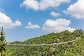 Fototapeta na wymiar Geierlay suspension bridge in the mountains near Morsdorf, Germany