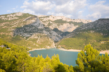 The panoramic view of the Gorges du Verdon and the lake of Sainte Croix in Europe, in France, Provence Alpes Cote dAzur, in the Var, in the summer, on a sunny day.
