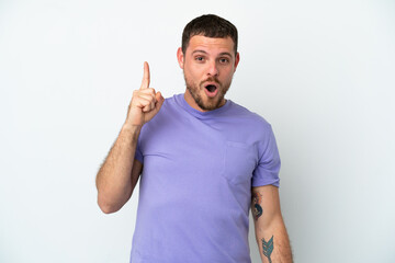 Young Brazilian man isolated on white background intending to realizes the solution while lifting a finger up