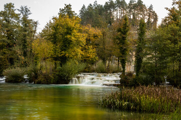 waterfall in autumn park