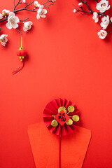 Chinese lunar new year background design concept with white plum blossom and festive decoration.
