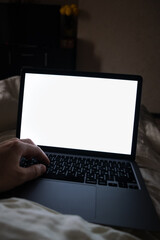 laptop white screen working in bed