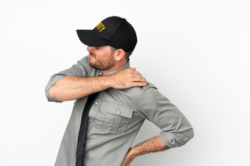 Young security Brazilian man isolated on white background suffering from pain in shoulder for having made an effort