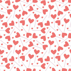 Vector seamless pattern with heart shaped lollipops on white. Great for fabrics,  Valentine's day  wrapping papers.