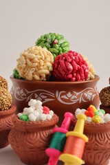 Indian festival makar sankranti concept, Sesame seed ball or til ke laddo with Kite String