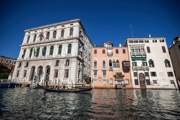 Obraz premium Island murano in Venice Italy. View on canal with boat and motorboat water. Picturesque landscape.