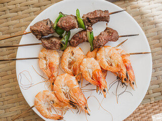Plate with seafood. Top view, close-up. Tasty and healthy food concept