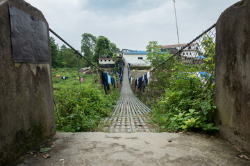 Hanging bridge with uniforms