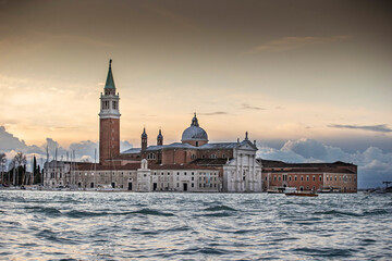 Fototapeta premium Island murano in Venice Italy. View on canal with boat and motorboat water. Picturesque landscape.