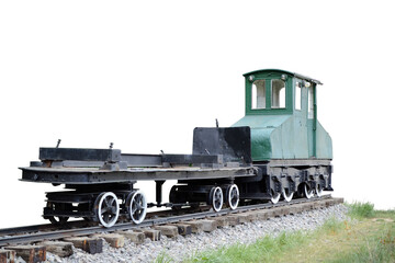 Naklejka premium Old train (trolley) with gravel and green grass isolated on white background.